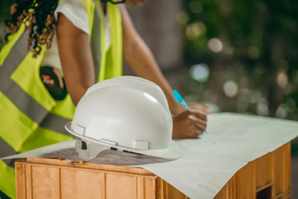 Construction accountant working on architectural plans