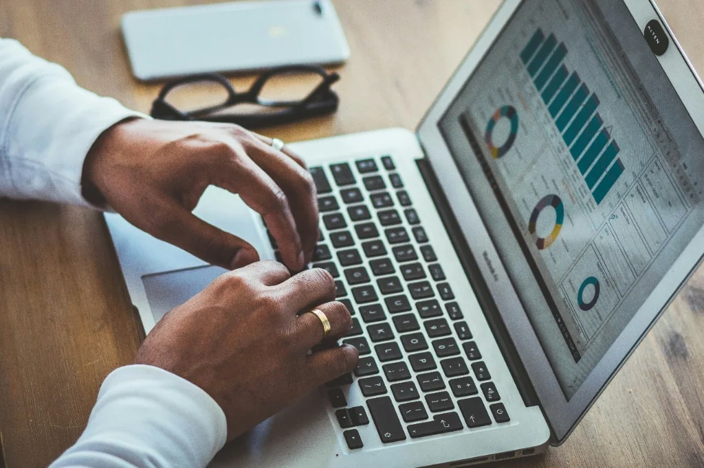 Financial analysis and business performance dashboard displayed on laptop